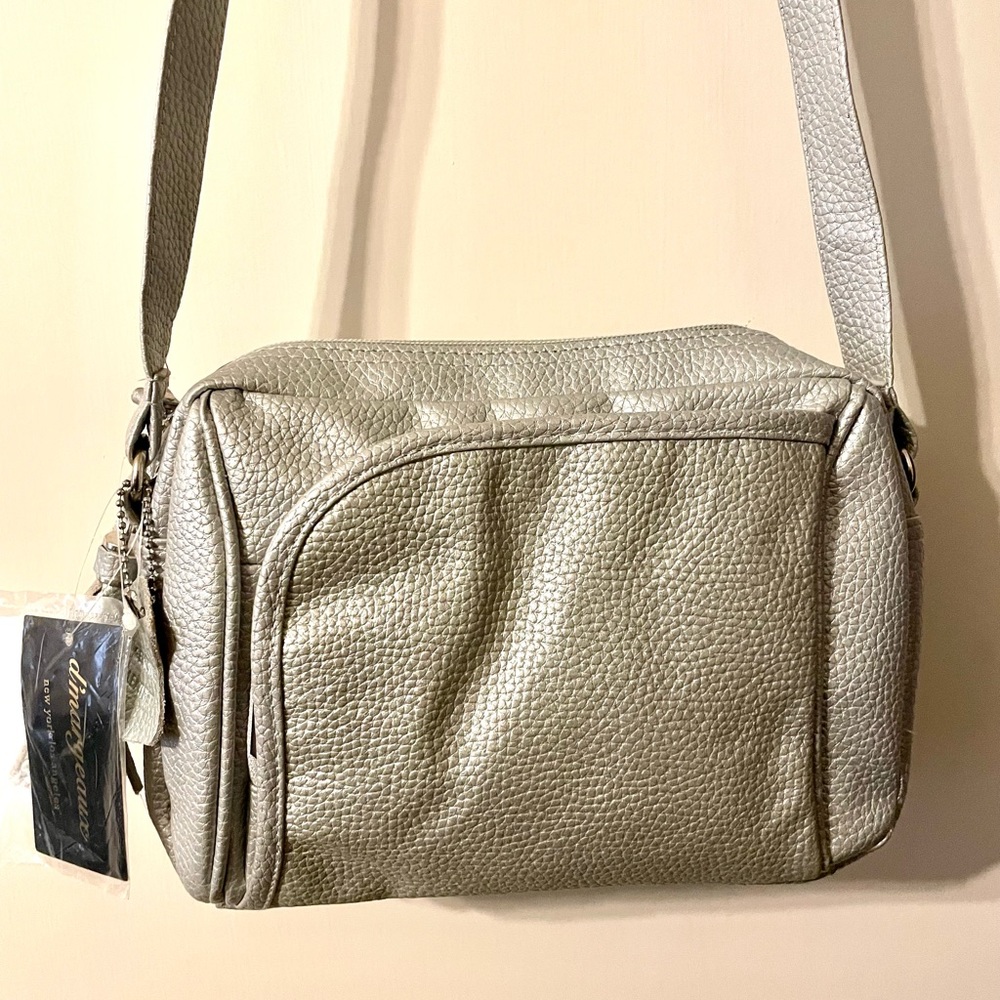 🔥PRICE DROP‼️Brand New With Tags‼️ Silver in color. Shoulder bag. ❤️